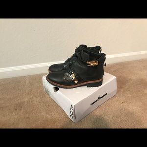 Chunky woman’s boots with gold details